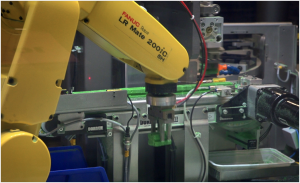 A yellow manufacturing arm for Bell Labs